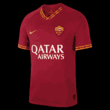 a red jersey with the words qatar airways on it