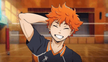 a volleyball player with orange hair is smiling and holding his hand to his face