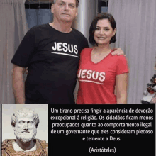 a man and woman wearing jesus shirts pose for a photo