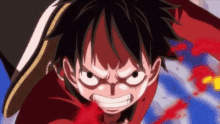 a close up of monkey d luffy from one piece with a very angry look on his face and blood coming out of his mouth