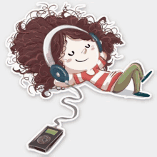 a girl is laying on the floor listening to music with headphones and a ipod .