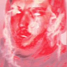 a close up of a man 's face with a red background