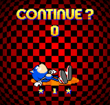 sonic the hedgehog is laying down in a video game screen that says " continue "