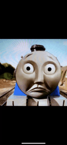 a close up of a thomas the tank engine 's face