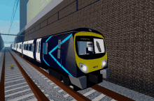 a blue and yellow train that says ed on the front