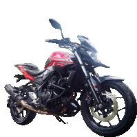 a red and black motorcycle with the word yamaha on the front