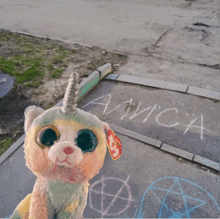 a stuffed animal with a tag that says ' beanie boos '