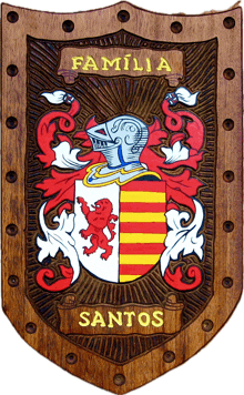 a wooden coat of arms with the name familia santos