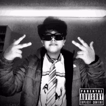 a boy wearing sunglasses and a tie is on a parental advisory album