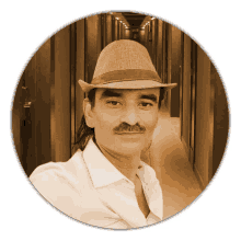 a man with a mustache wearing a hat and a white shirt