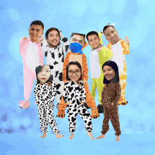 a group of people are posing for a picture with their faces on their pajamas