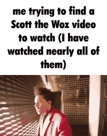 a man in a red suit is walking down a hallway with the words `` me trying to find scott the woz video to watch ''