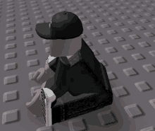 a cartoon character wearing a black hat is sitting on a block