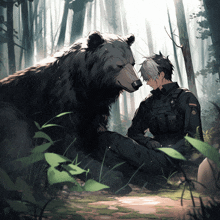 a man is kneeling down next to a large bear in the woods