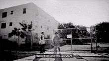 a black and white photo of people standing in front of a fence with the caption what i felt after the accident