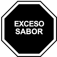 a black octagon sign that says exceso sabor in white letters