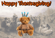 a teddy bear sitting in front of a painting with the words happy thanksgiving