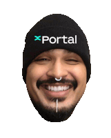 a man with a beard wearing a black beanie that says portal