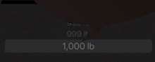 a black screen with a speech bubble that says 999 lbs