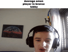 a man wearing headphones with the words average omen player in bronze lobby below him