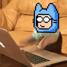 a pixel art of a person using a laptop