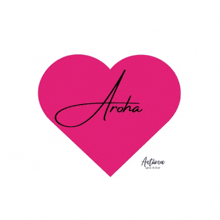 a pink heart with the word aroha on it