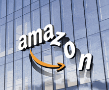 the amazon logo is on a glass building