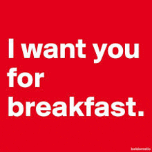 a red sign that says i want you for breakfast .