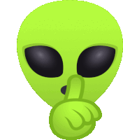 a green alien with a finger on its mouth