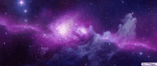 a purple and blue galaxy with the words hd wallpaper on the bottom right