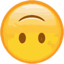 a yellow smiley face with two brown eyes and a slight smile on its face .