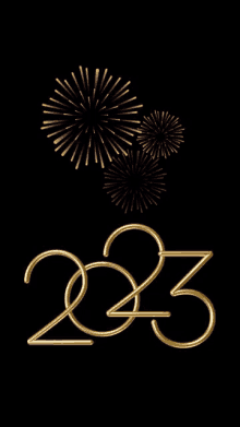 a black background with fireworks and the year 2023 in gold