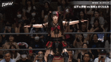 a woman in a wrestling ring with tjpw on the bottom