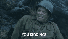 a man in a military uniform is asking " you kidding "