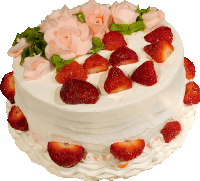 a cake with strawberries and roses on top