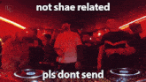 a group of people dancing in a dark room with the words " not shae related pls dont send " on the bottom