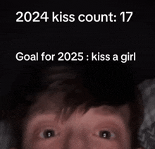 a close up of a person 's face with the words " 2024 kiss count 17 goal for 2025 kiss a girl "