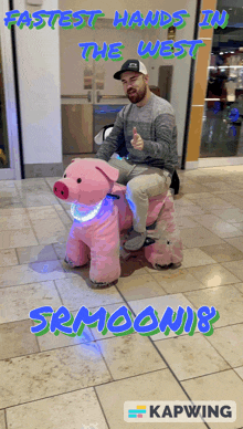 a man is riding a pink pig with the words fastest hands in the west