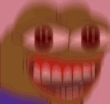 a blurred image of a cartoon character with red eyes and red teeth .