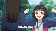 a girl in a blue jacket with the words potato power on the bottom right