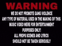 a warning sign that says ' we do not promote gang violence ' on it