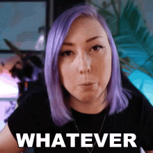 a woman with purple hair has the word whatever on her face