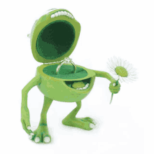 a green monster holding a daisy and an engagement ring