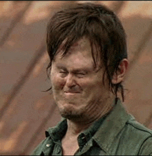 daryl dixon from the walking dead is making a funny face .