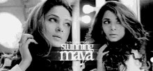 a black and white photo of two women with the words stunning maya on the bottom right