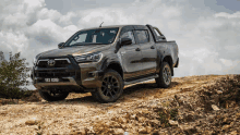 a toyota hilux truck with a license plate that says ves 8398