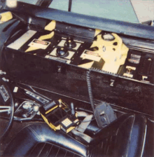 a close up of the dashboard of a car with a steering wheel and a steering wheel .