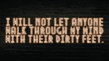 a neon sign on a brick wall says i will not let anyone walk through my mind with their dirty feet