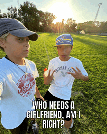 a boy wearing a t-shirt that says american eagle stands next to another boy