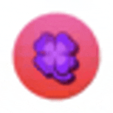 a red circle with a purple clover on it